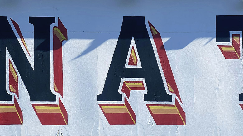 Painted wall letterforms Hand-painted letterforms on a New Orleans wall, used as a type reference
