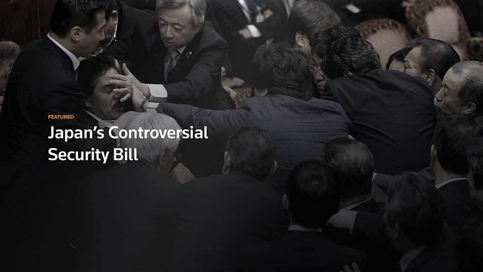Featured story card Featured story card reading Japan's Controversial Security Bill over a press scrum photo