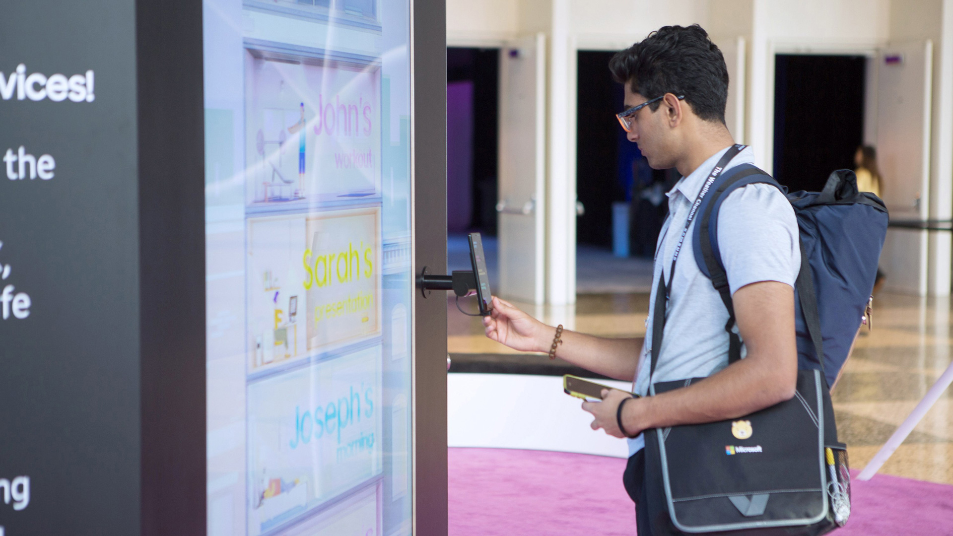 Attendee using the controller Attendee using a handheld controller to select a card on the wall